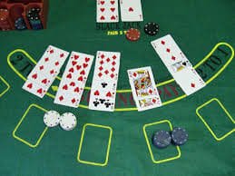 Live-dealer studio at granat slot showing multiple table cameras and multilingual dealer setup