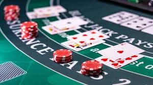 Galactic Gems live blackjack table interface showing dealer, cards, and betting controls